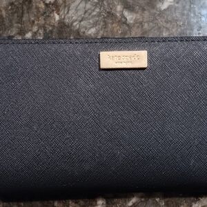 New with tags Kate Spade Newbury Lane bi-fold wallet.